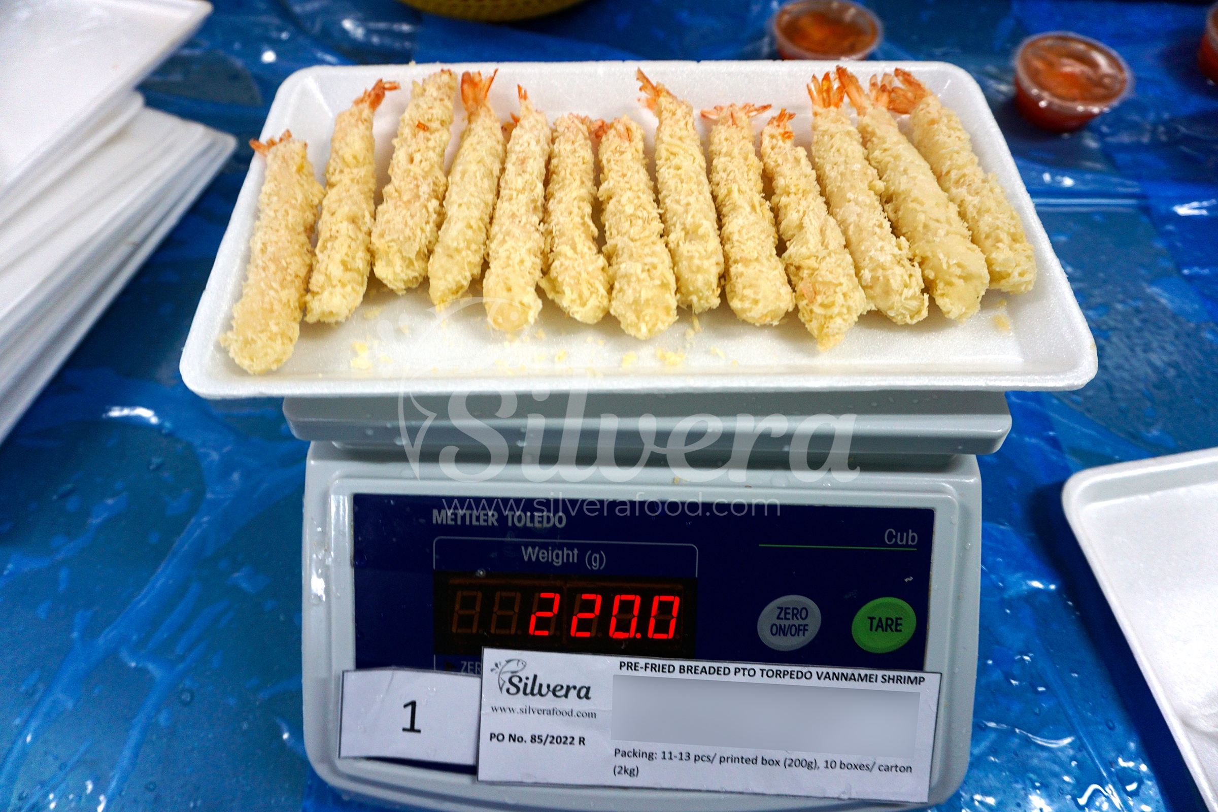 Frozen pre-fried breaded torpedo shrimps