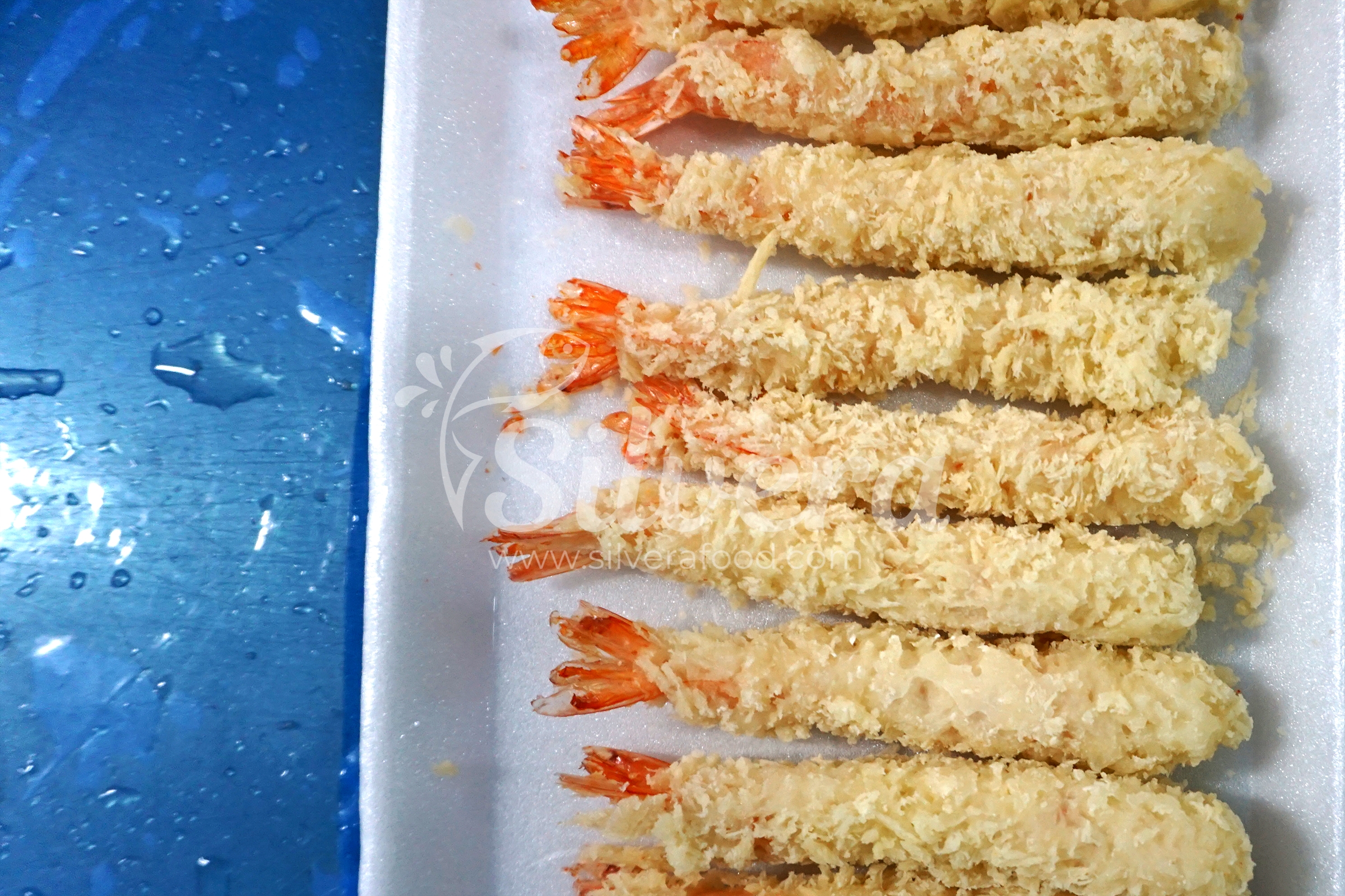 Frozen pre-fried breaded torpedo shrimps