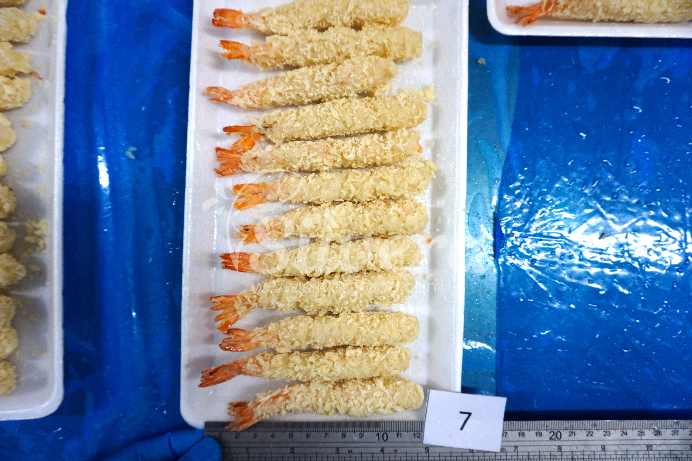 Frozen pre-fried breaded torpedo shrimps