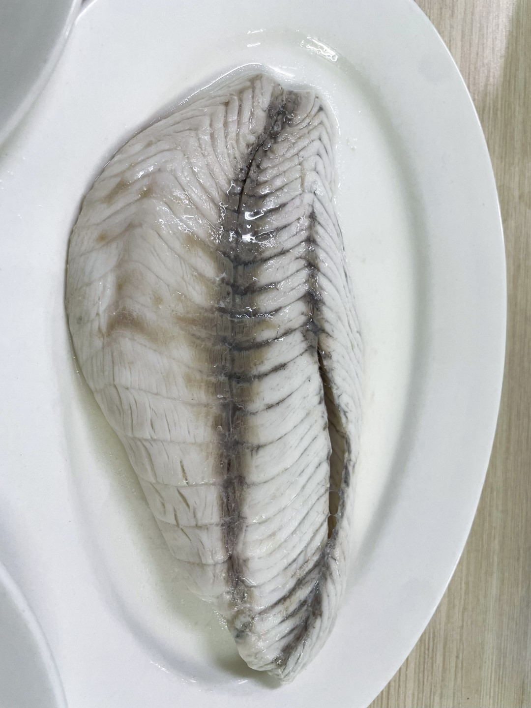 Cooked barramundi fillet skinless